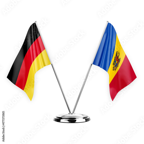 Two table flags isolated on white background 3d illustration, germany and moldova