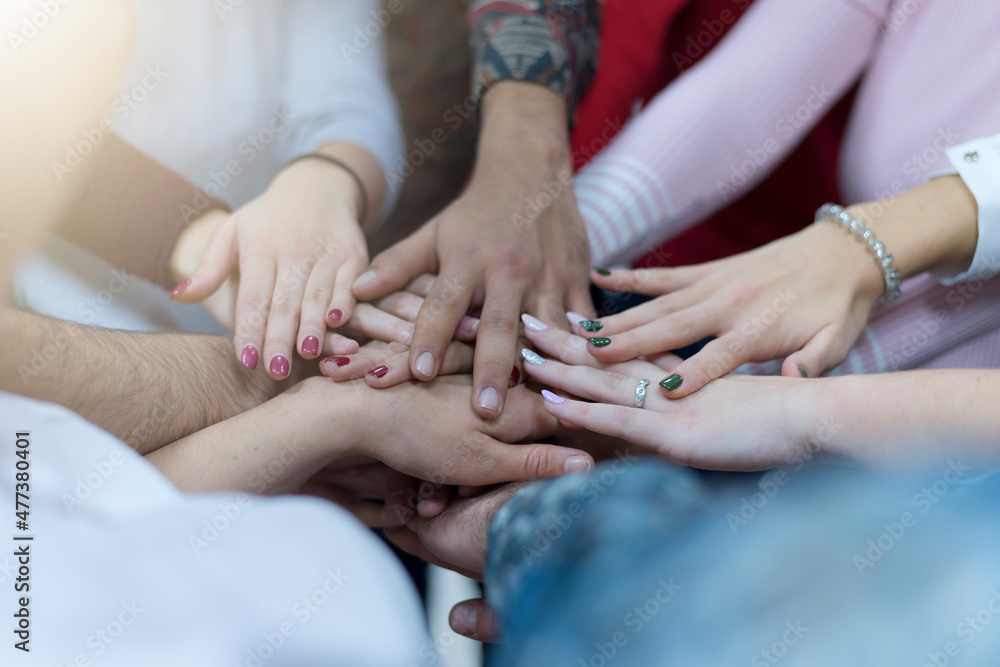 College Students Teamwork Stacking Hand Concept College Students Teamwork Stacking Hand Concept
