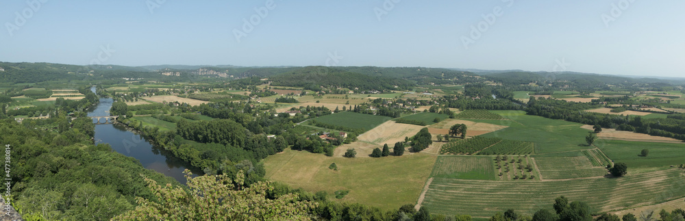 Amazing green view from a castle near the dordogne river around some fields cultivated.  Panoramic picture
