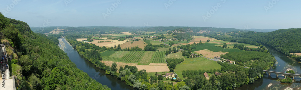 Amazing green view from a castle near the dordogne river around some fields cultivated.  Panoramic picture