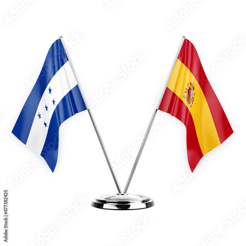 Two table flags isolated on white background 3d illustration, honduras and spain