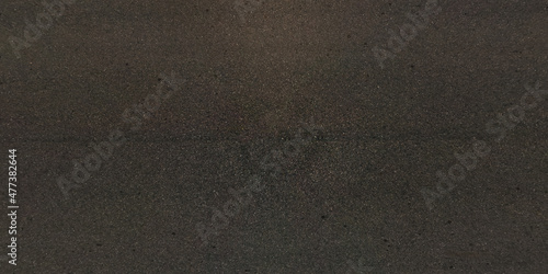 view from above on surface texture of old asphalt road with cracks Fototapet