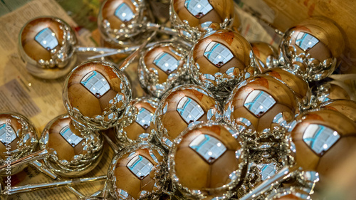 Christmas balls in the workshop for the production of Christmas toys, painting balls in the shop.