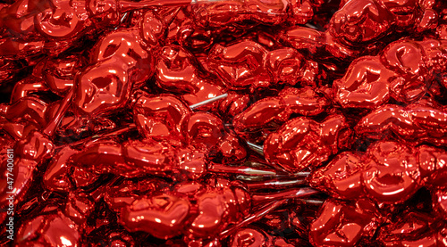 Christmas decorations, top view of a pile of glass balls painted red, Greeting gift card template.