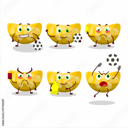 Orange gummy candy cartoon character working as a Football referee