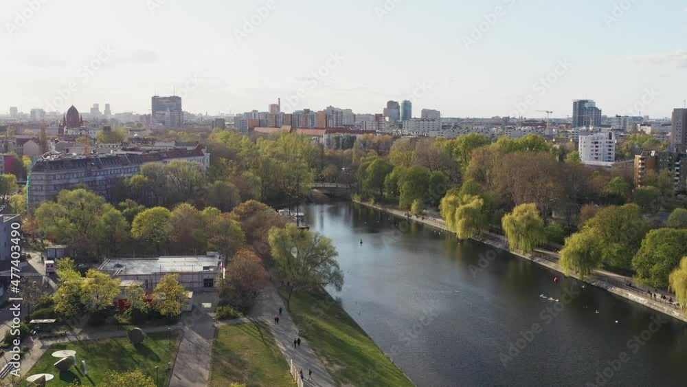 Panoramic view of Landwehrkanal channel river with the skyline of Kreuzberg and berlin Panoramic view of Landwehrkanal channel river with the skyline of Kreuzberg and berlin