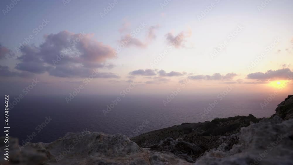 Dramatic sunset over Mediterranean sea, Malta. Time Lapse