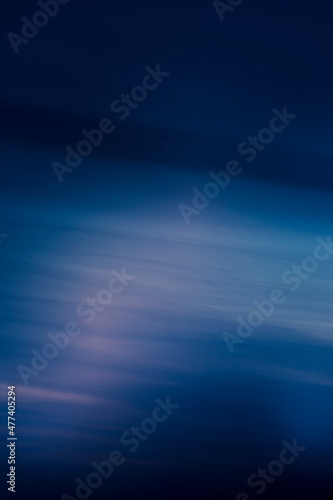 Creative blue wallpaper with sky pattern. Dark shapes and texture, gradient effect, smooth and soft colors. No selective focus, defocused background. © juste.dcv