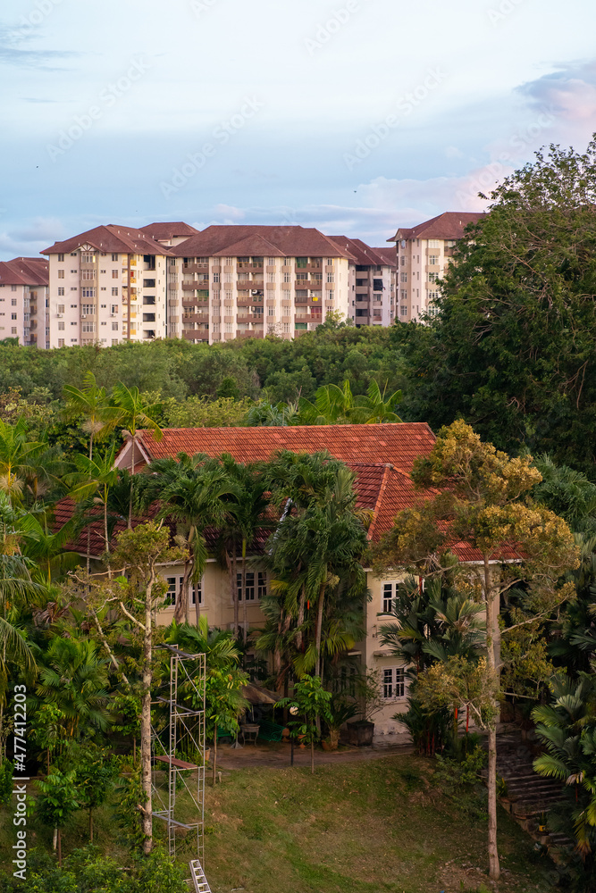 Modern apartment architecture buildings and colonial house.