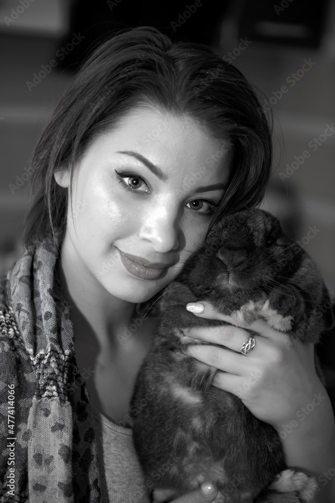 Portrait of a woman with a brown rabbit
Portrait of a woman with a brown rabbit