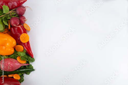 Flat lay of a huge group of fresh vegetables and fruit on white background - Vegetables VS Fruit - High-quality studio shot - Flat lay