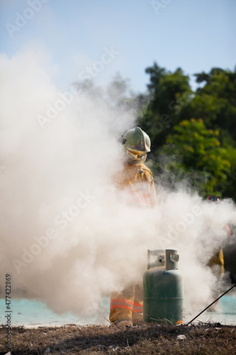 Firefighter with fire and suit for protect fire fighter for training firefighters.