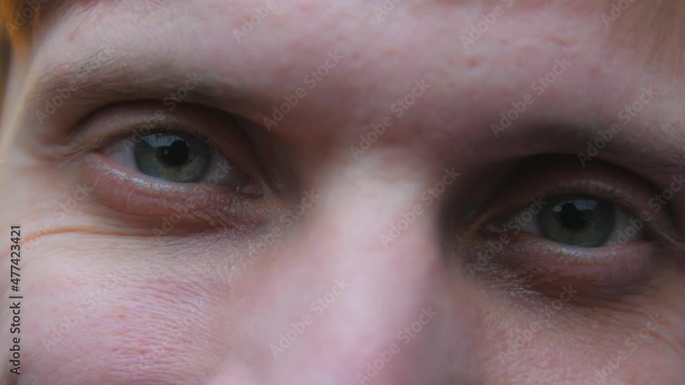 Smiling man eyes close up Smiling man eyes close up
