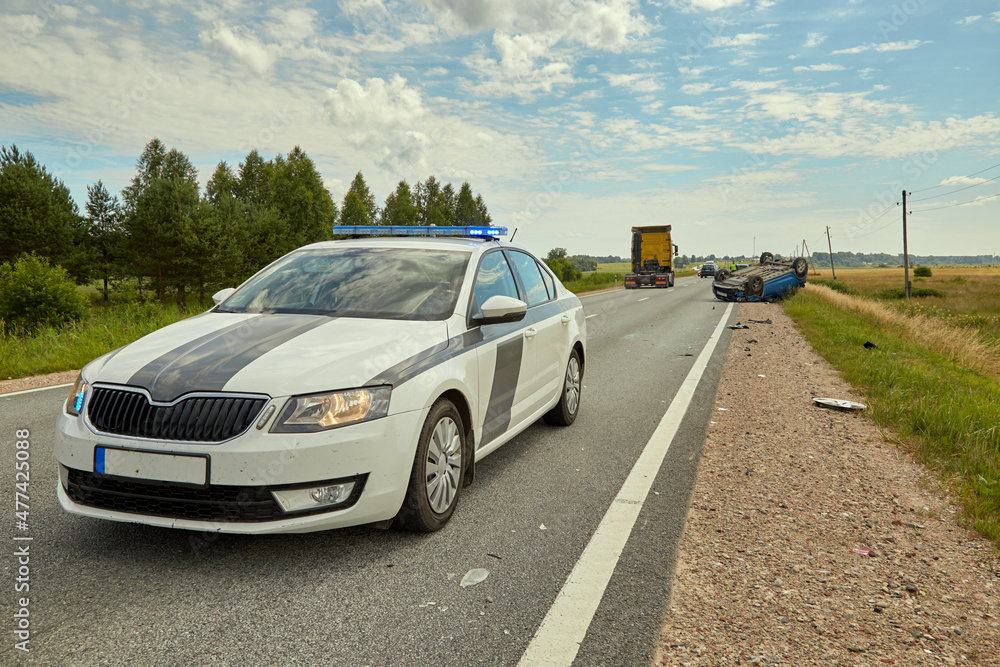 Police car on a scene of accident on a road Police car on a scene of accident on a road