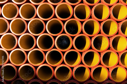 corrugated pipes production orange plastic