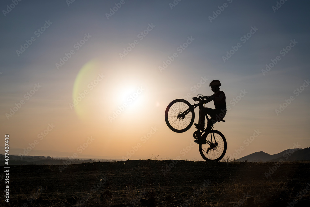 Fototapeta premium aerobatic show and frenzy of the young biker
