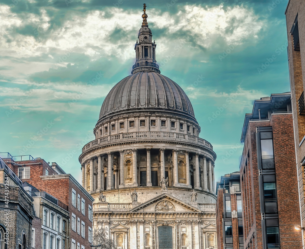 London, United Kingdom - January 2013: St. Paul's Cathedral under dramatic clouds. The cathedral is one of the most famous and most recognizable sights of London