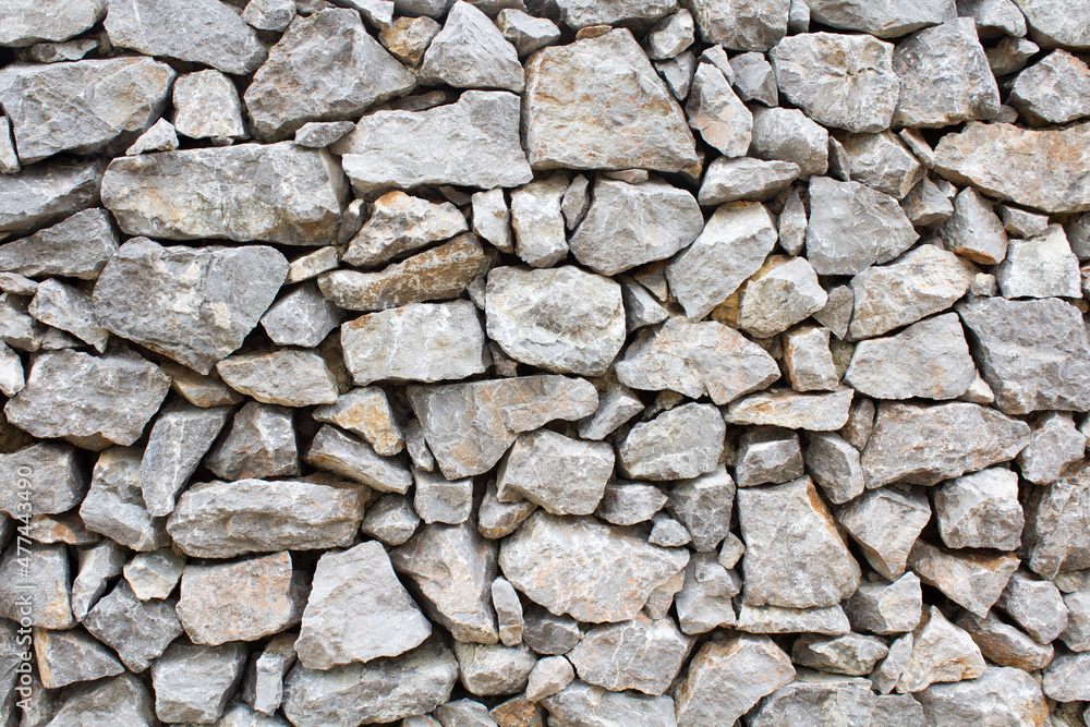 Fototapeta premium Stone wall with old gray stones