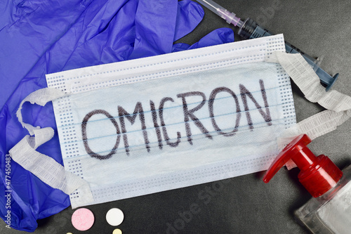 omicron written on mask