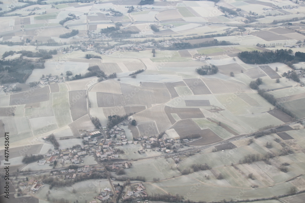 aerial view of a landscape with a agriculture and villages 