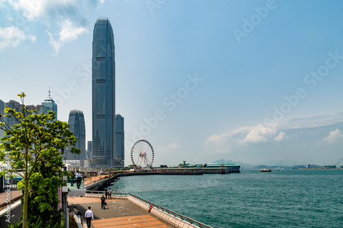 Skyscraper and Ferris wheel in the Central District of Hong Kong Island, Hong Kong. photo
