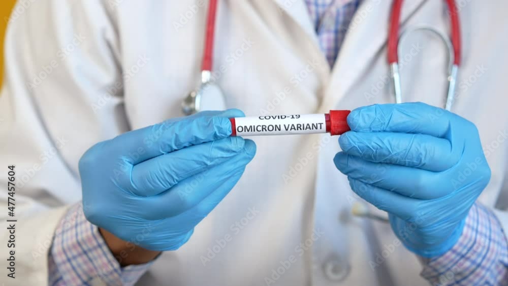  hand hold omicron variant corona virus blood test tube 