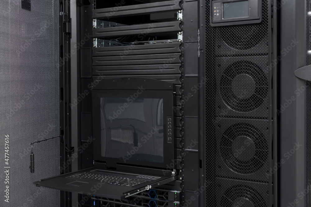 Data Center With Multiple Rows of Fully Operational Server Racks. Modern Telecommunications, Cloud Computing, Artificial Intelligence, Database, Supercomputer Technology Concept. Data Center With Multiple Rows of Fully Operational Server Racks. Modern Telecommunications, Cloud Computing, Artificial Intelligence, Database, Supercomputer Technology Concept.