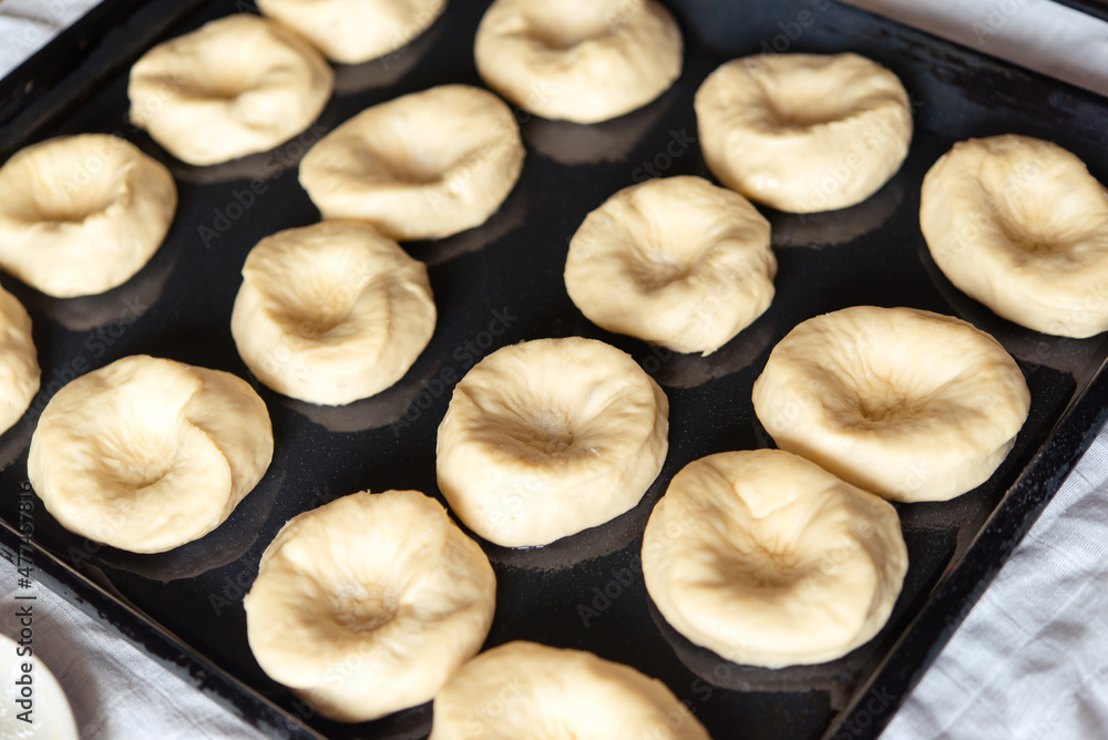 Preparing the dough on a baking sheet. Handmade homemade cakes.