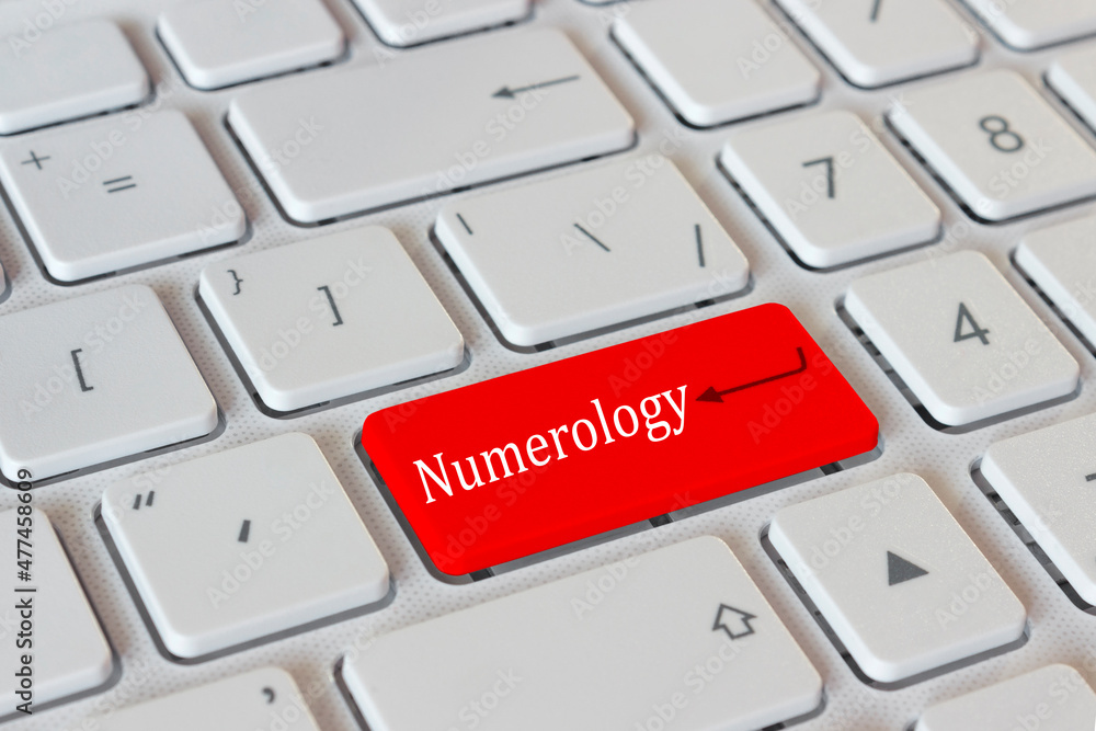 the word numerology on the enter key on the computer the word numerology on the enter key on the computer