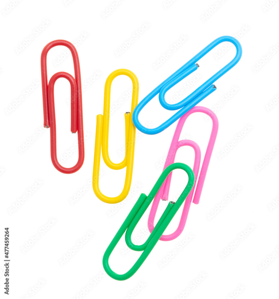 Multi-colored paper clips isolated on a white Multi-colored paper clips isolated on a white