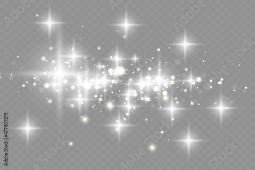 The dust sparks and golden stars shine with special light. Vector sparkles on a transparent background. Christmas light effect. Sparkling magical dust particles.