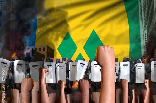 Fotografi Protest in Saint Vincent and the Grenadines - police swat stand against the angr