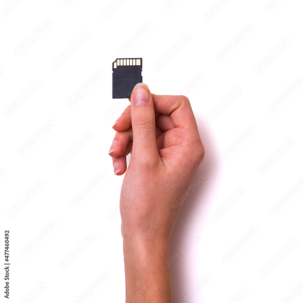 hand with SD card isolated white background hand with SD card isolated white background