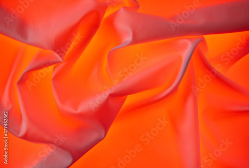 Red fabric material as an abstract background.