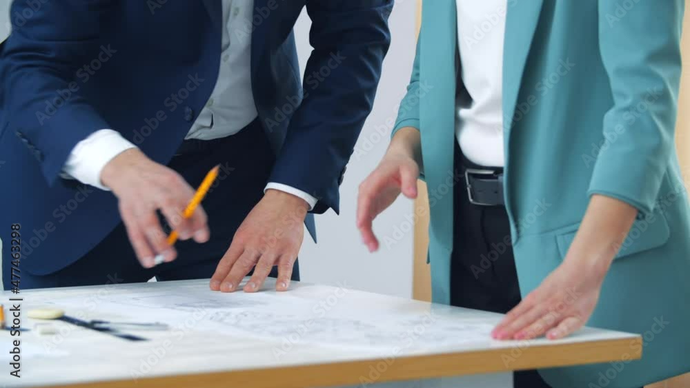 4k close up video of hands working with papers at office. 4k close up video of hands working with papers at office.