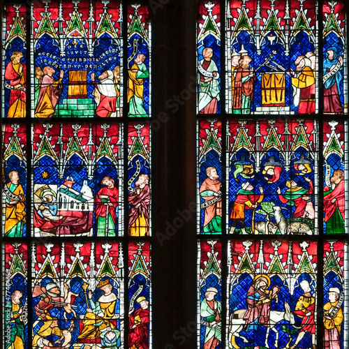 Stained glass window from inside a cathedral in Strasbourg, France. established in the 1400's in the Alsace Region. Europe. photo