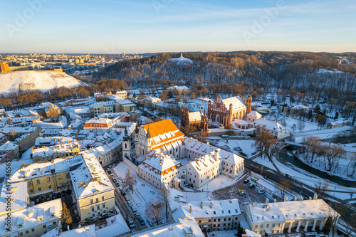 Aerial winter sunny frozen day view of snowy Vilnius old town, Lithuania