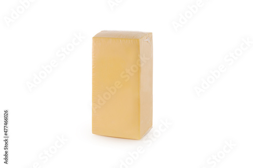 Large rectangular piece of cheese on white background isolated