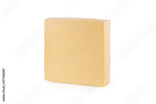 Big square piece of cheese on a white background Isolated