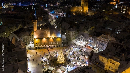 Aerial nigh-time view to the famous traditional Christmas market on the town hall square in Tallinn, Estonia