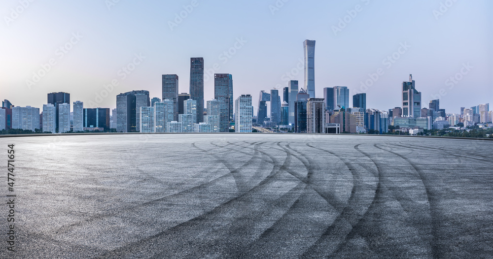 Fototapeta premium Panoramic skyline and modern commercial office buildings with empty road in Beijing, China.