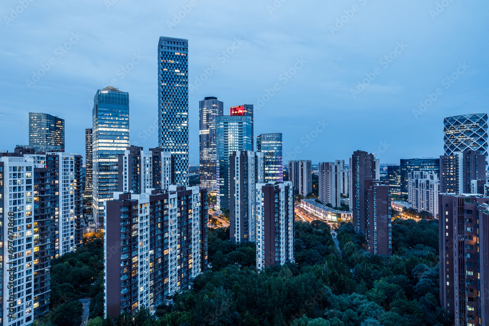 Fototapeta premium Panoramic skyline and modern commercial buildings in Beijing at night