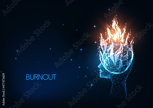Futuristic burnout, stress concept with glowing low polygonal human head and fire isolated on dark blue