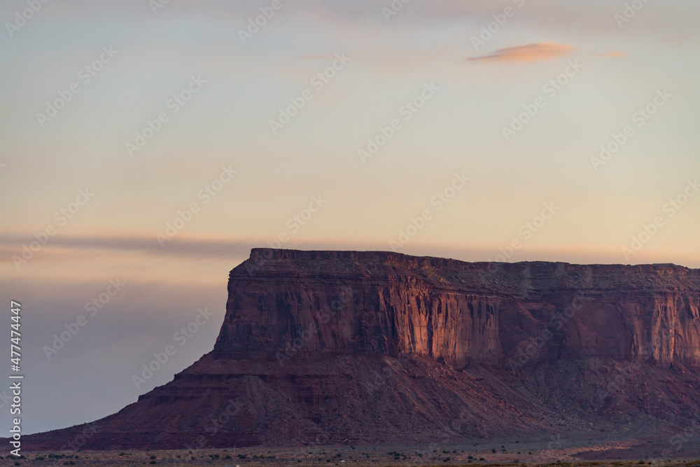 Monument Valley Arizona Utah scenic butte at sunrise. 