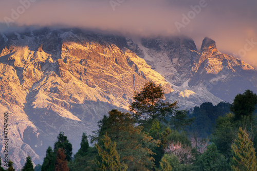 Beautiful view of Himalayan mountains at Ravangla, Sikkim. Himalaya is the great mountain range in Asia with more than 50 peaks , mostly highest, including mount Everest. photo