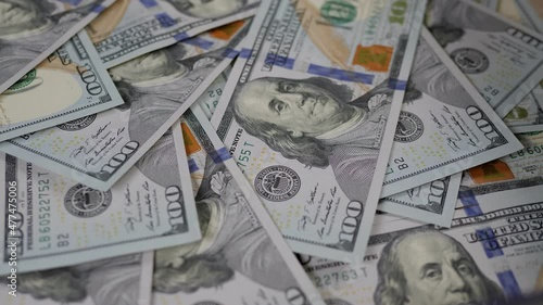 Wallpaper Mural Close-up of a lot of hundred-dollar bills slowly rotating. Financial concept. Background of US dollar bills. Torontodigital.ca