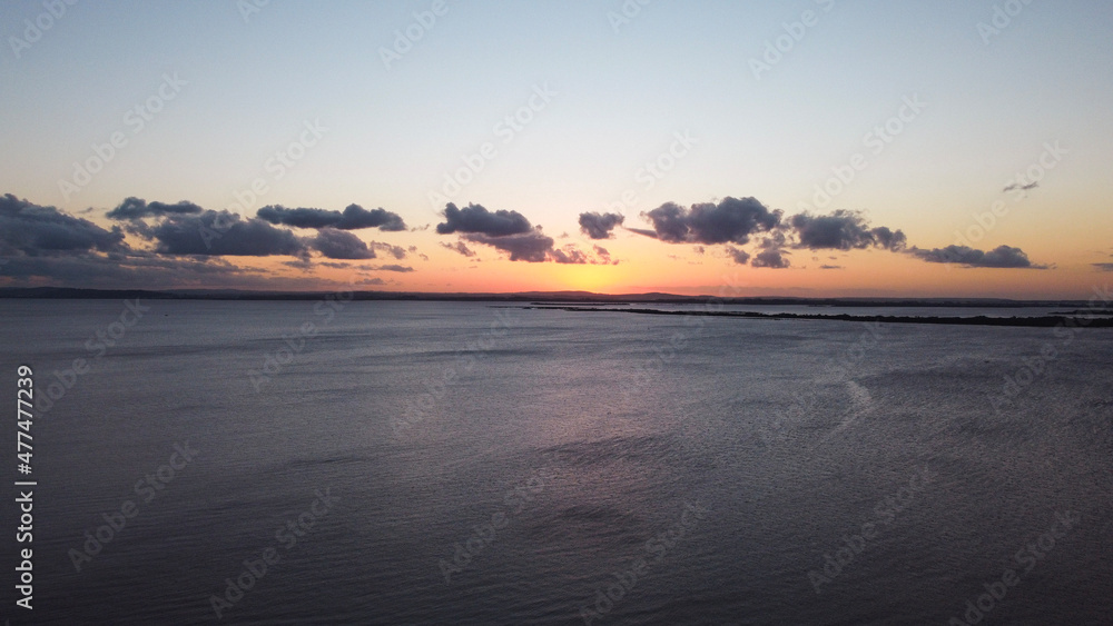 Obraz premium sunset over the river