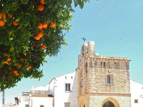 Cathedral of Faro or Se catedral de Faro with a bell tower at the Algarve coast of Portugal