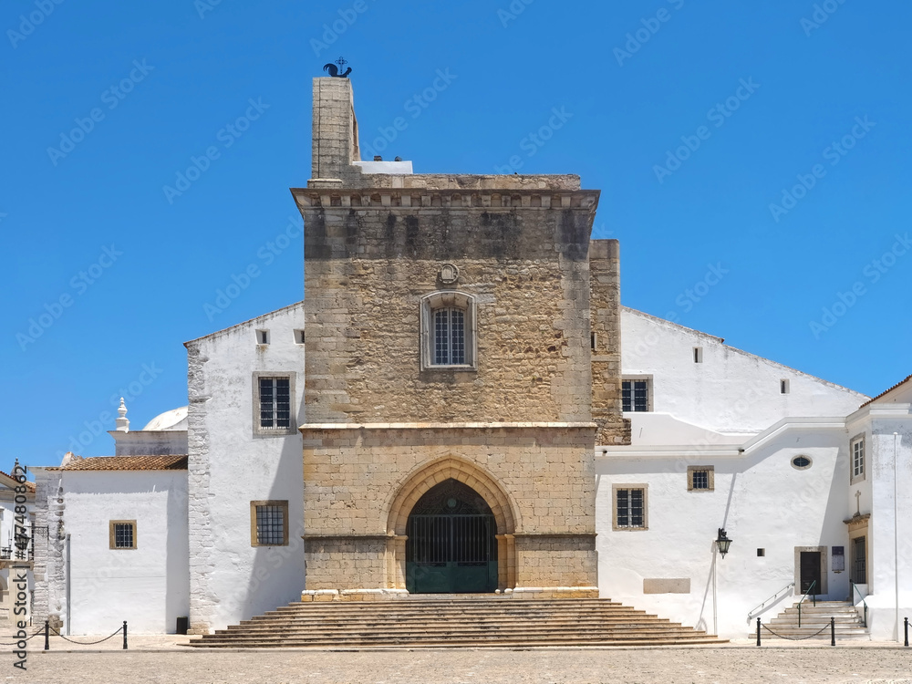 Cathedral of Faro or Se catedral de Faro with a bell tower at the Algarve coast of Portugal