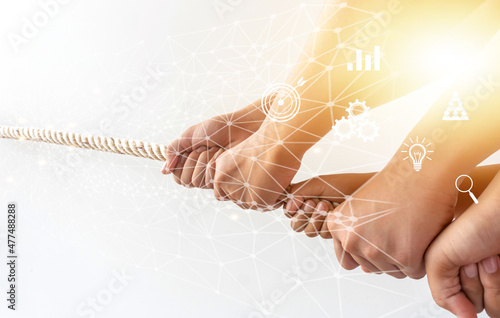 Hand pull rope concept of digital smart work with technology and team work